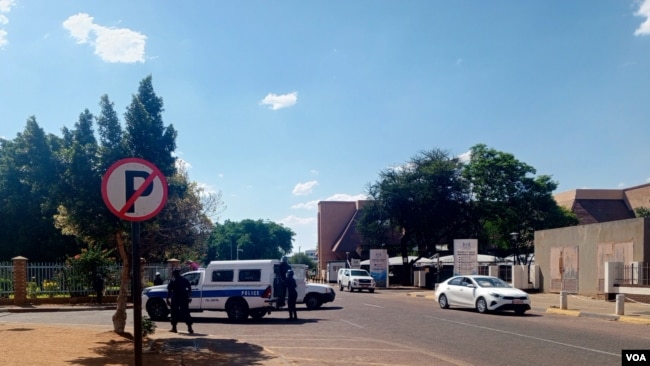Police vehicles patrol roads leading to the Zimbabwe Embassy in Gaborone, Botswana, Oct. 26 2024. (Mqondisi Dube/VOA)