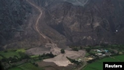 An aerial view shows an area affected by a landslide caused by a heavy rains, in Arequipa, Peru Feb. 6, 2023. REUTERS/Oswaldo Charcas