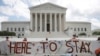 FILE - DACA recipients and their supporters celebrate outside the U.S. Supreme Court after the court ruled in a 5-4 vote that U.S. President Donald Trump's 2017 move to rescind DACA, was unlawful, Washington, June 18, 2020. This week, DACA marks its 10th year.