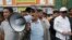 Pro-ruling party demonstrators stage a protest rally in front of National Assembly, in Phnom Penh, Cambodia, Monday, Oct. 26, 2015. 