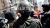 Security forces stand guard in front of the Presidential Palace during a protest in La Paz, Bolivia, Oct. 29, 2019. 