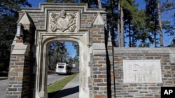 FILE - An entrance to the main Duke University campus is seen in Durham, NC, Jan. 28, 2019. 