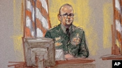 In this courtroom sketch, Staff Sgt. Patrick Ziggler, who was injured in the Fort Hood shootings, appears on the witness stand in a courtroom sketch during the sentencing phase in the trial for Maj. Nidal Hasan, Aug. 26, 2013, in Fort Hood, Texas. 