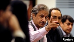 FILE - Absar Alam, then Chairman of the Pakistan Electronic Media Regulatory Authority (PEMRA), attends a planning meeting with senior staff in Islamabad, Pakistan, June 1, 2016.