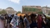 Student protesters march around their encampment on the Columbia University campus, April 29, 2024, in New York. Student protests over the Israel-Hamas war have popped up at many college campuses following the arrest of demonstrators this month at Columbia University. 