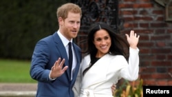 Britain's Prince Harry and Meghan Markle in the Sunken Garden of Kensington Palace, London.