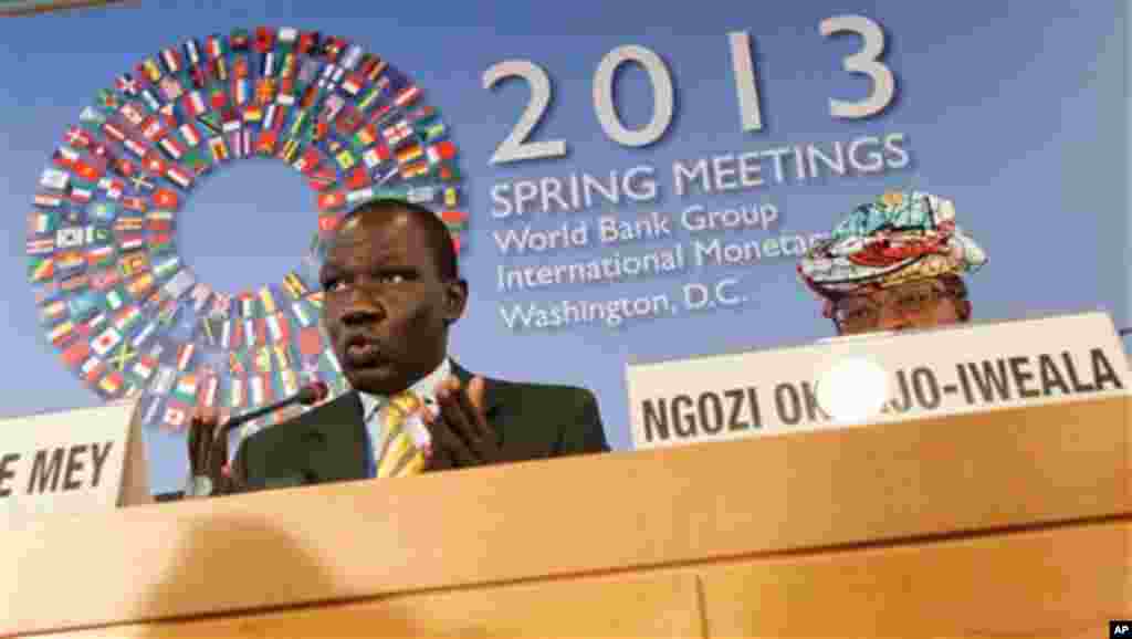 Ngozi Okonjo-Iweala, right, of Nigeria listens as Alamine Ousmane Mey, Minister of Finance of Cameroon, speaks at the World Bank IMF Spring Meetings in Washington, April 20, 2013.
