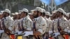 FILE - Members of Iran's Islamic Revolutionary Guard Corps march just outside Tehran during an armed forces parade, Sept. 22, 2011. The elite Quds Force represents one of eight branches of the IRGC.