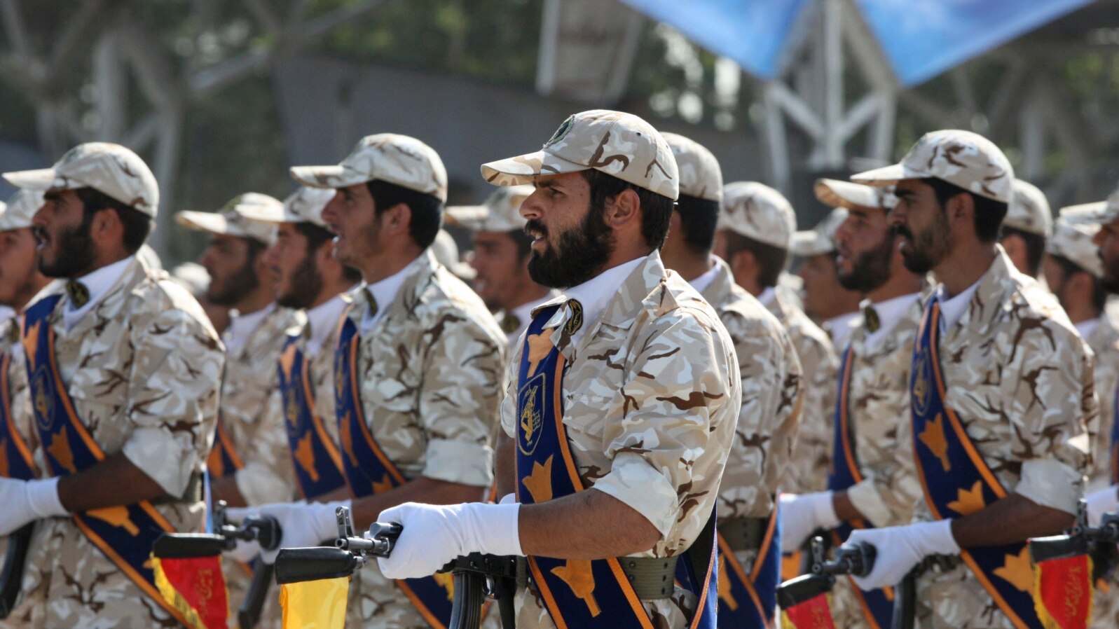 FILE - Members of Iran's Islamic Revolutionary Guard Corps march just outside Tehran during an armed forces parade, Sept. 22, 2011. The elite Quds Force represents one of eight branches of the IRGC.