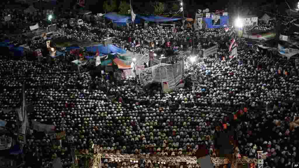 Supporters of Egypt's ousted President Mohammed Morsi gather for prayers at Nasr City, July 28, 2013.
