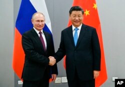Vladimir Putin i Xi Jinping