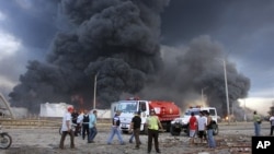 委內瑞拉消防人員繼續奮力撲救最大煉油廠的火警