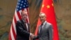 Wang Yi, right, the director of the Communist Party's Central Foreign Affairs Commission Office shakes hands with White House national security adviser Jake Sullivan, left, at Yanqi lake in Beijing, Aug. 27, 2024.