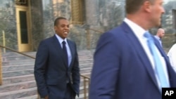 FILE - In an image taken from video, rapper and entrepreneur Jay Z appears outside of court in Los Angeles, Oct. 13, 2015.