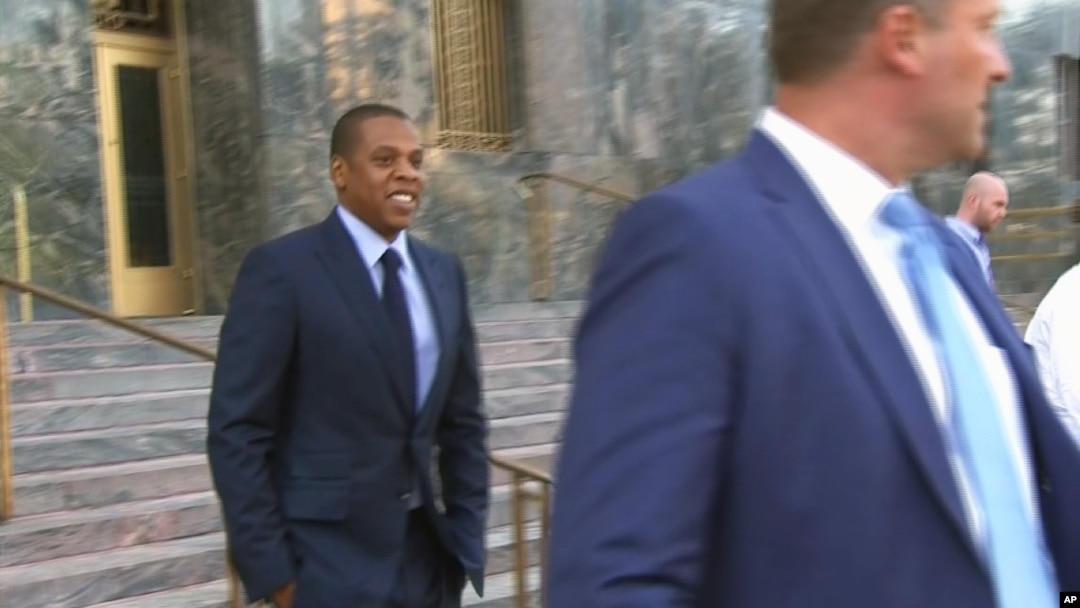 FILE - In an image taken from video, rapper and entrepreneur Jay Z appears outside of court in Los Angeles, Oct. 13, 2015.