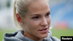 Darya Klishina talks to the media after competing the women's long jump in Zhukovsky, Russia, June 6, 2016.