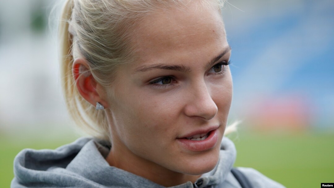 Darya Klishina talks to the media after competing the women's long jump in Zhukovsky, Russia, June 6, 2016.