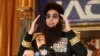 Sasha Baron Cohen, dressed as his alter-ego Admiral General Aladeen from his upcoming film, "The Dictator," speaks during a news conference, Monday, May 7, 2012, at The Waldorf Astoria Hotel in New York. 