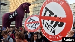 Thousands of people demonstrate against the Transatlantic Trade and Investment Partnership (TTIP) and the EU-Canada Comprehensive Economic and Trade Agreement (CETA) in the center of Brussels, Belgium, Sept. 20, 2016.