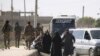 US-backed Forces Deny They Allowed IS Fighters to Evacuate Raqqa
