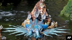 A water creature floats in a pond at Pandora-World of Avatar land attraction in Disney's Animal Kingdom theme park at Walt Disney World in Lake Buena Vista, Florida. The 12-acre land, inspired by the “Avatar” movie, opens at the end of May.