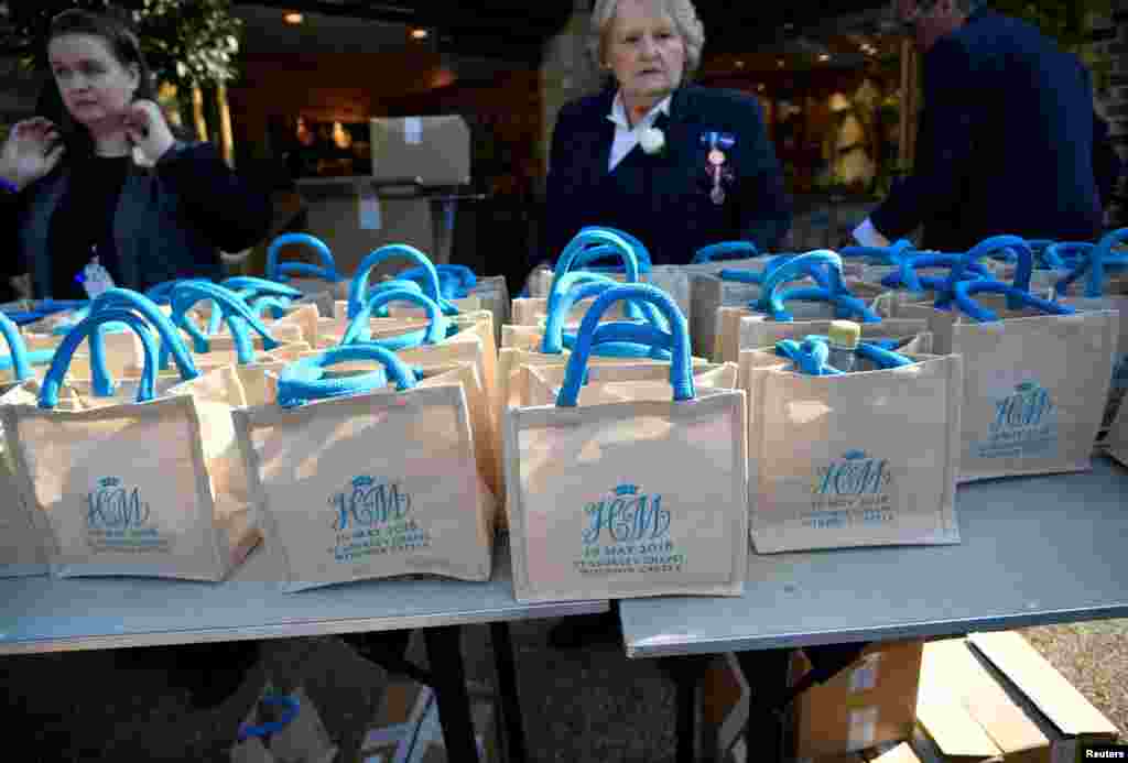 Bags with the wedding monogram of Britain's Prince Harry and Meghan Markle are seen ahead of their wedding in Windsor, Britain, May 19, 2018. 