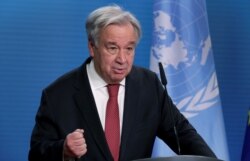 FILE - U.N. Secretary-General Antonio Guterres talks with reporters in Berlin, Germany, Dec. 17, 2020.