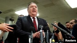 FILE - U.S. Secretary of State Mike Pompeo speaks to the media on Capitol Hill in Washington, Nov. 28, 2018.