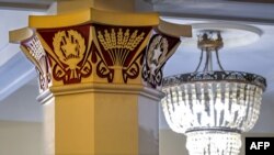 The 1938 Rodina ("Motherland") cinema has huge pillars decorated with Soviet mosaics, Dec. 13, 2018..