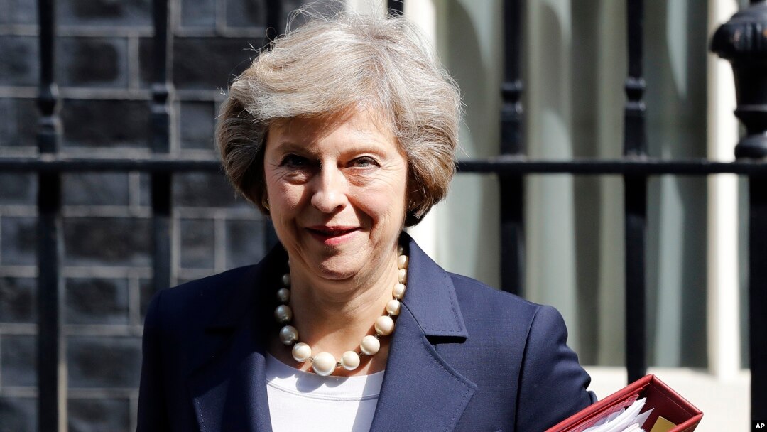 FILE- Britain's Prime Minister Theresa May leaves 10 Downing street in London, July 20, 2016. ﻿