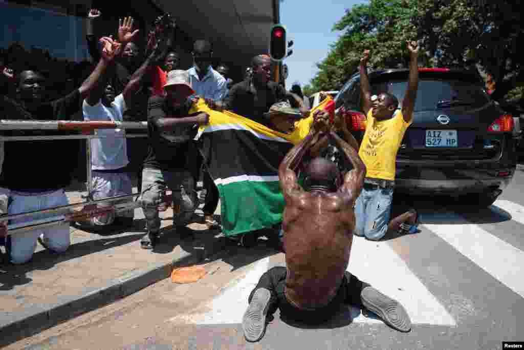 Supporters of opposition member Venancio Mondlane protest during the inauguration of the ruling Frelimo party&#39;s leader Daniel Chapo as Mozambique&#39;s newly elected President in Maputo.