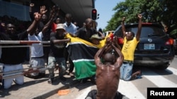 Supporters of opposition member Venancio Mondlane protest during the inauguration of the ruling Frelimo party's leader Daniel Chapo as Mozambique's newly elected President in Maputo, Mozambique, Jan. 15, 2025. 