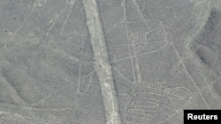 FILE - An aerial view of the Whale Nazca Lines in the Nazca desert, Peru.