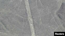 FILE - An aerial view of the Whale Nazca Lines in the Nazca desert, Peru.