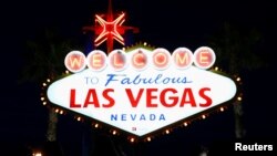 Tourists take pictures in front of the iconic 'Welcome to Fabulous Las Vegas' sign on Las Vegas Boulevard in Las Vegas, Feb. 26, 2018. Las Vegas is known for casinos and parties, but it also has the University of Nevada Las Vegas.