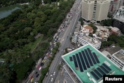 Solar panels are pictured on the roof of a building in Bangkok, Thailand, Aug. 9, 2017.