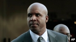 FILE - Former baseball player Barry Bonds arrives for his trial at federal court in San Francisco, March 29, 2011.