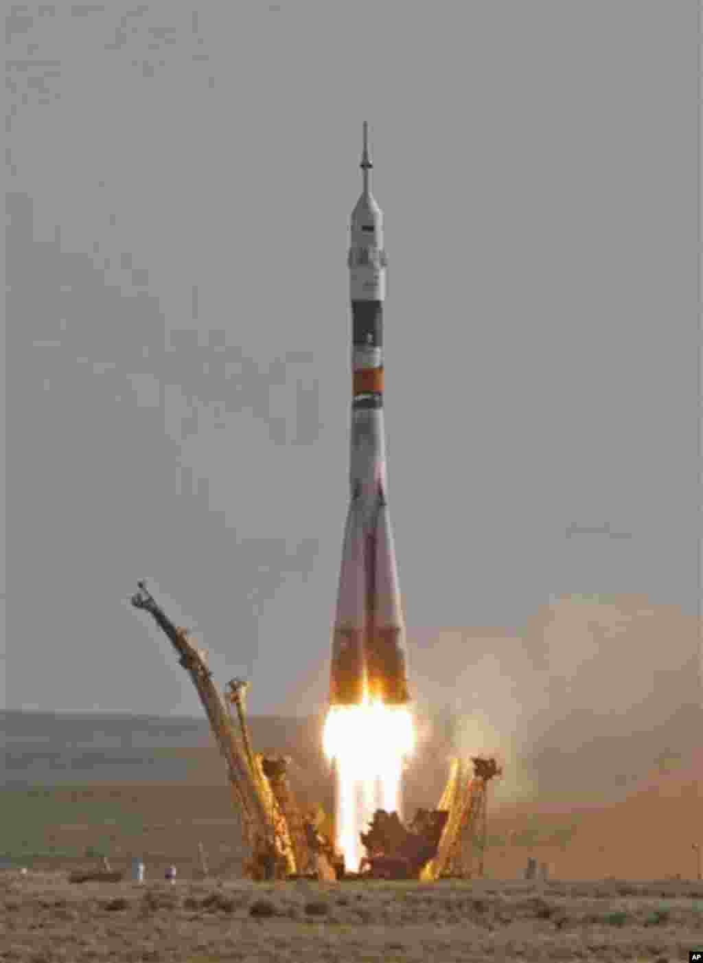 The Soyuz-FG rocket booster with a Soyuz TMA-04M spaceship carrying a new crew to the International Space Station, ISS, blasts off from the Russian leased Baikonur cosmodrome, in Kazakhstan, Tuesday, May 15, 2012. The Russian rocket is carrying U.S. astro