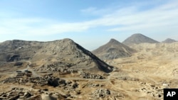 A general view of Mes Aynak valley, some 40 kilometers (25 miles) southwest of Kabul, Afghanistan, Jan. 18, 2015. The Afghan government is trying to grab President Donald Trump’s attention by dangling its massive, untouched wealth of minerals, including lithium, the silvery metal used in mobile phone and computer batteries considered essential to modern life.