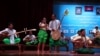 Pech Sarath, founder and a president of Community of Living Chapei, performed Chapei music during the first-ever Chapei Performance Festival at Chaktumuk Theater in Phnom Penh, Cambodia, Sunday, April 3, 2016. (Leng Len/VOA Khmer) 