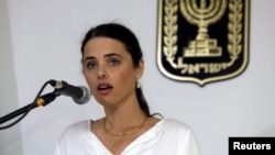 FILE - Ayelet Shaked, Israel's new Justice Minister of the far-right Jewish Home party, speaks during a ceremony at the Justice Ministry in Jerusalem, May 17, 2015. 