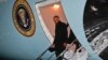 President Barack Obama steps off Air Force One during his arrival at O'Hare International Airport in Chicago, Jan. 10, 2017. 