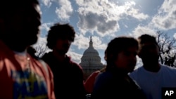 Immigration advocates gather for a rally on Capitol Hill in Washington, Jan. 23, 2018.