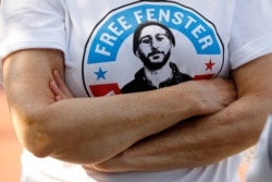 A person wears a T-shirt calling for the release of U.S. journalist Danny Fenster, in Huntington Woods, Michigan, on June 4, 2021.