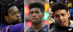 FILE - From left, Jalen Hill, Cody Riley and LiAngelo Ball, arrested in China for allegedly shoplifting, are being required by police to remain at their luxury Hangzhou hotel until legal proceedings against them are finished.