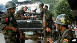 FILE - Soldiers of the Kachin Independence Army (KIA) are seen in Laiza, a border town of China and Myanmar, in Kachin State, Myanmar, Nov. 2, 2013.