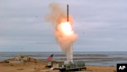 This Aug. 18, 2019 photo provided by the U.S. Defense Department shows the launch of a conventionally configured ground-launched cruise missile on San Nicolas Island off the coast of California. 