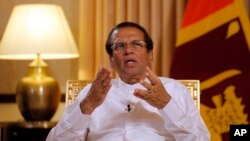 Sri Lankan President Maithripala Sirisena speaks during an interview with the Associated Press at his residence in Colombo, May 7, 2019.