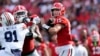 Georgia quarterback Carson Beck (15) throws from the pocket in the first half of an NCAA college football game against Auburn, Oct. 5, 2024, in Athens, Georgia.