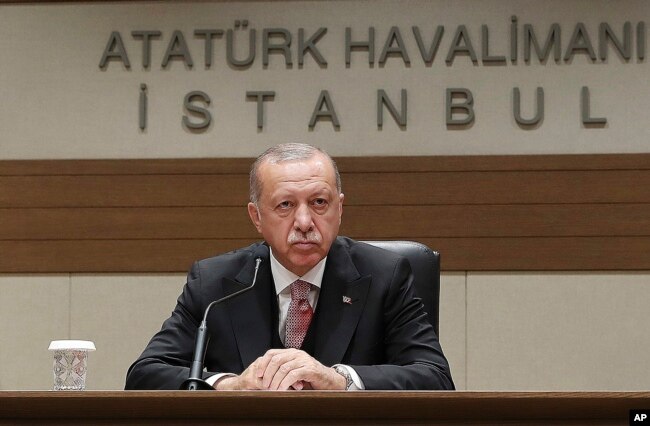 Turkey's President Recep Tayyip Erdogan talks to members of the media regarding the local elections, in Istanbul, April 8, 2019.